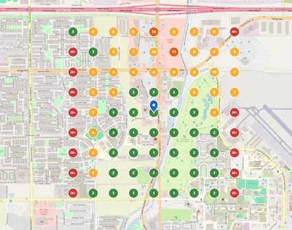 A real geo-grid ranking map with numbered colored markers across a local service area